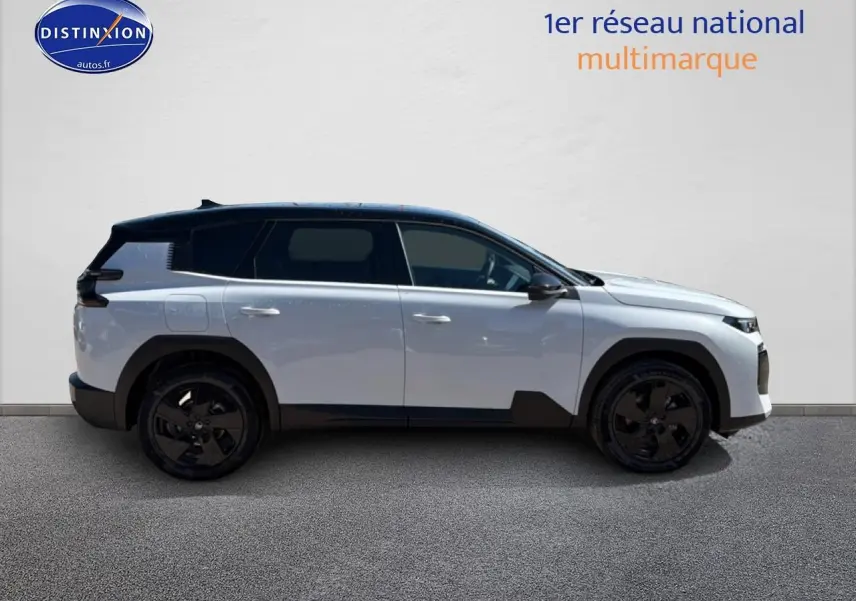 Profil droit du Citroën C5 Aircross hybride blanc et noir avec jantes alliage noires et toit bi-ton.