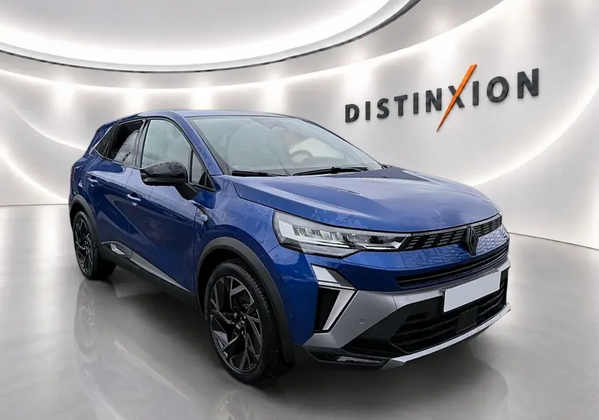 Renault Symbioz 2026 bleu iron en vue 3/4 avant droit, avec jantes noires et calandre distinctive.