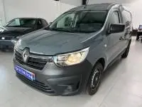 Renault Express Van gris 3/4 avant droit, porte latérale coulissante et enjoliveurs, intérieur utilitaire visible