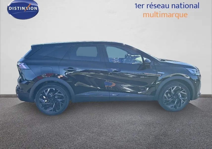 Profil gauche du Renault SYMBIOZ noir étoile métal 2025, SUV hybride avec jantes noires et lignes fluides modernes.