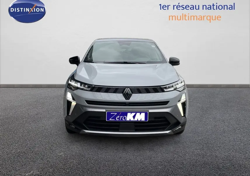 Vue frontale d'une Renault Symbioz gris rafale métal avec éclairage LED distinctif et calandre moderne.