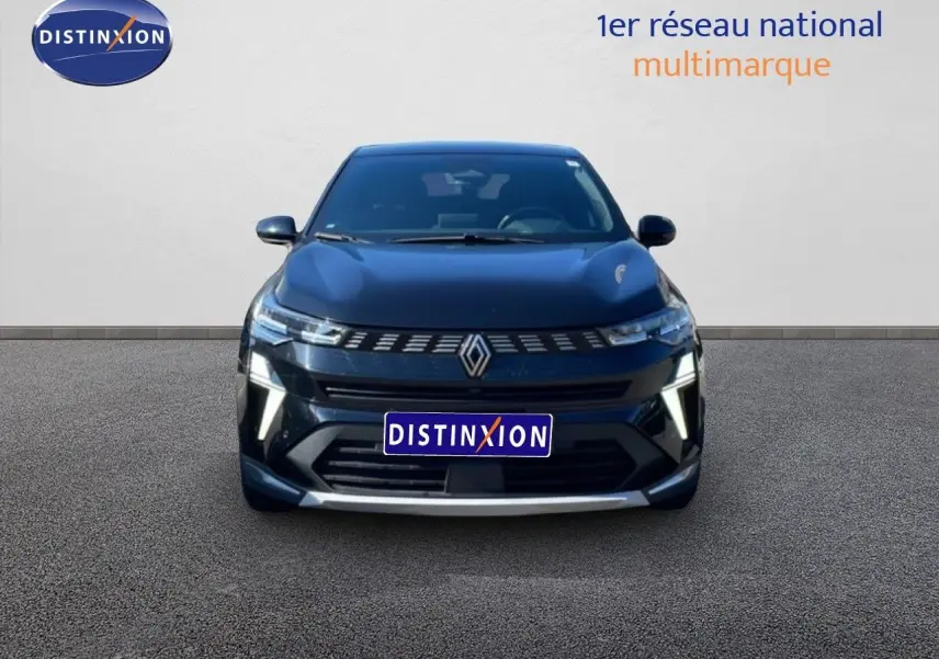 Vue de face du Renault Symbioz noir étoile métal 2025 avec calandre lumineuse et logo central distinctif.