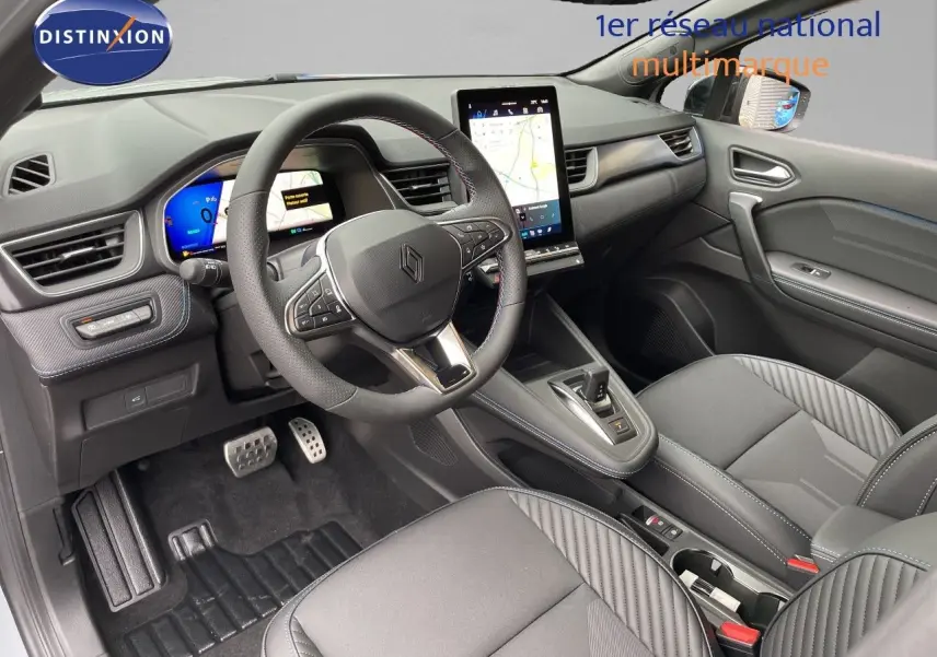 Vue intérieure côté conducteur du Renault Symbioz gris Rafale Metal, avec tableau de bord digital et écran tactile vertical.