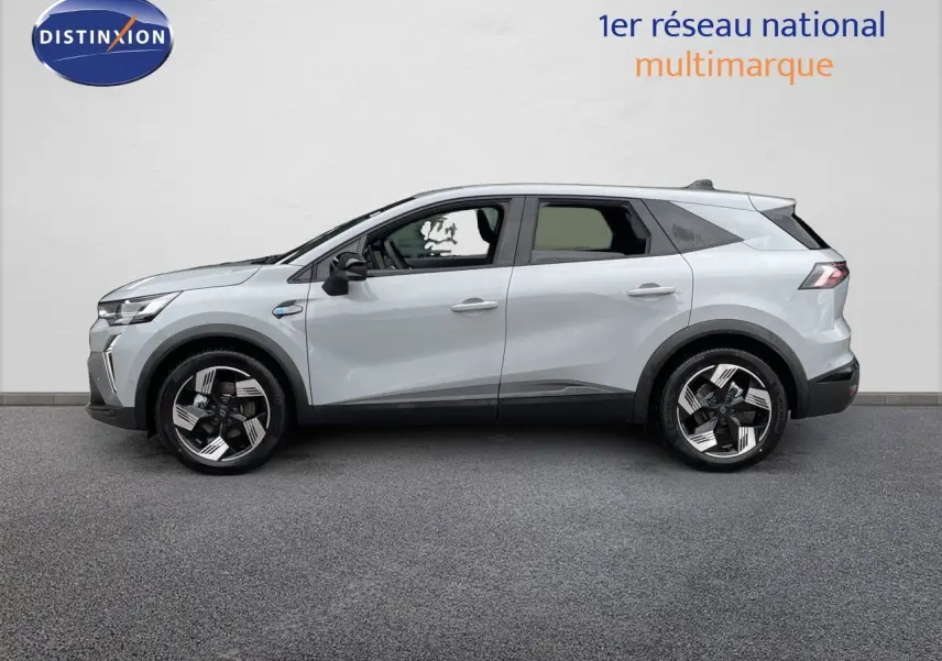 Profil droit du Renault Symbioz gris Rafale Métal 2026, SUV hybride avec jantes noires et argent modernes.