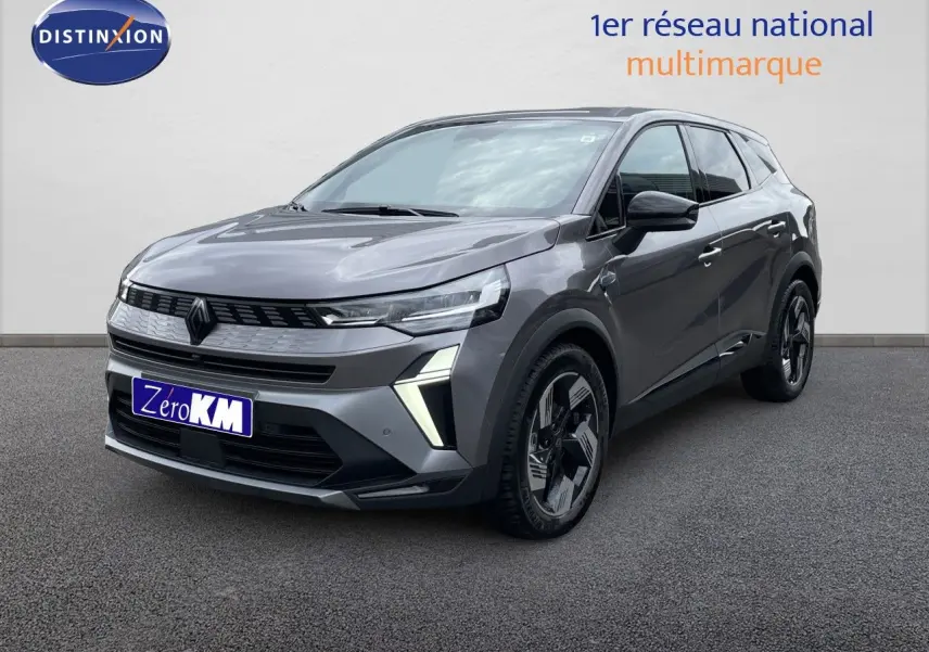 Vue 3/4 avant d'un Renault Symbioz gris cassiopée métallisé avec feux LED et jantes noires distinctives.