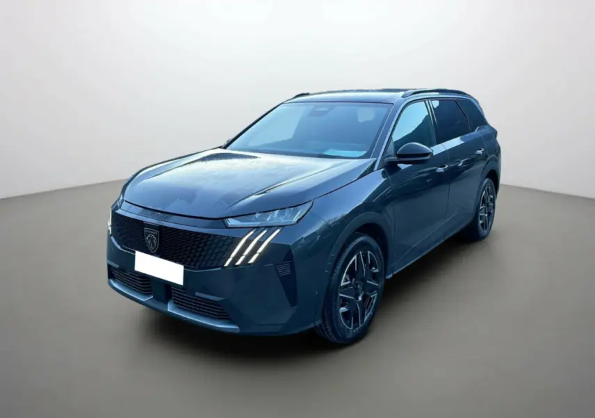 Peugeot 5008 Hybrid gris titane en 3/4 avant droit, avec feux LED distinctifs et jantes alu 19 pouces.