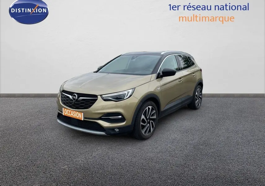 Opel Grandland X diesel doré vue 3/4 avant droit avec jantes alliage et toit noir contrasté