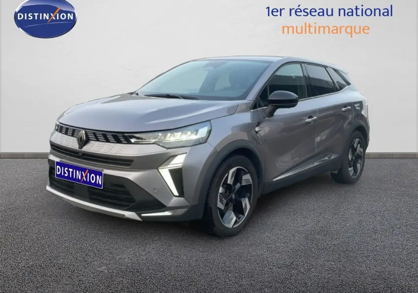Renault Symbioz E-Tech gris cassiopée, vue 3/4 avant droit, SUV hybride avec feux LED et jantes bi-ton.