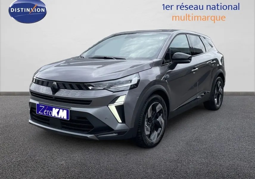 Renault Symbioz gris cassiopée métal en 3/4 avant droit, avec feux LED et jantes au design moderne.