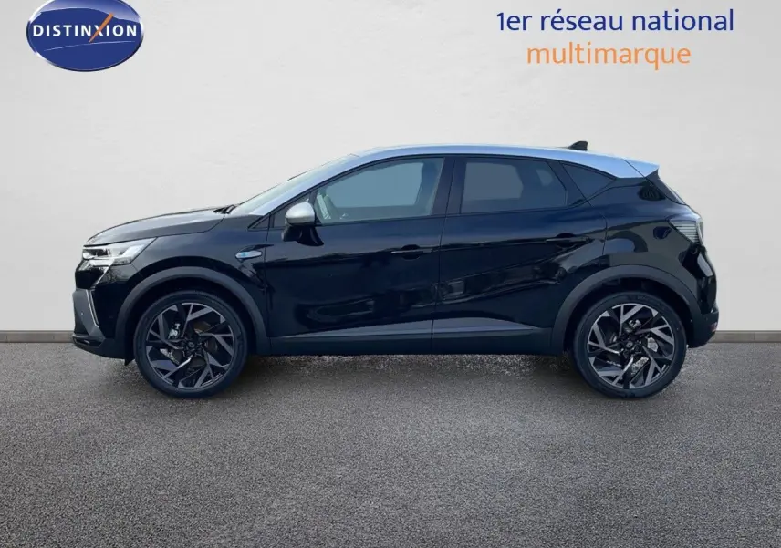 Profil côté gauche du Renault Captur E-Tech hybride noir étoile avec toit gris, jantes alliage et lignes modernes.