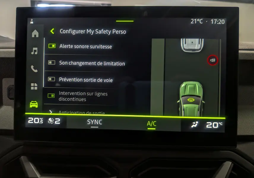 Écran tactile intérieur du Dacia Bigster 2026 montrant les réglages de sécurité avec représentation du véhicule vert cèdre en vue de dessus.