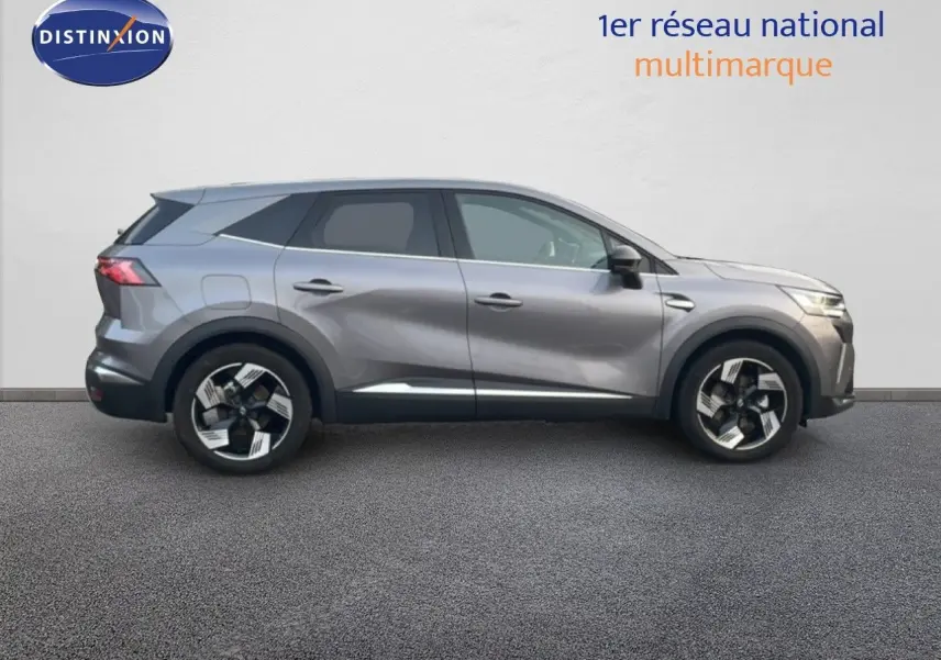 Profil droit du Renault Symbioz gris Casiopee Metal 2025, SUV hybride avec jantes alliage au design moderne.