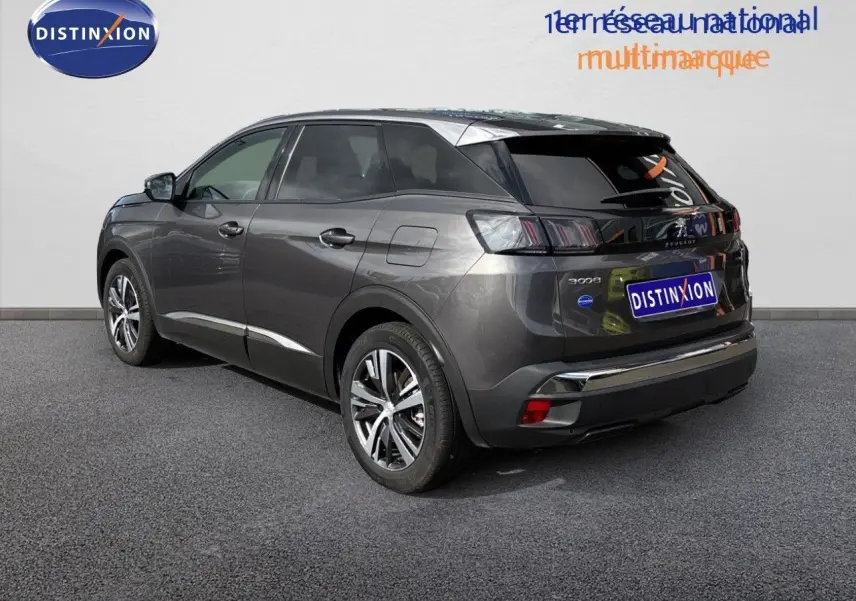 Peugeot 3008 Hybrid gris platinium métal, vue 3/4 arrière droit, avec jantes alliage et feux arrière LED distinctifs.