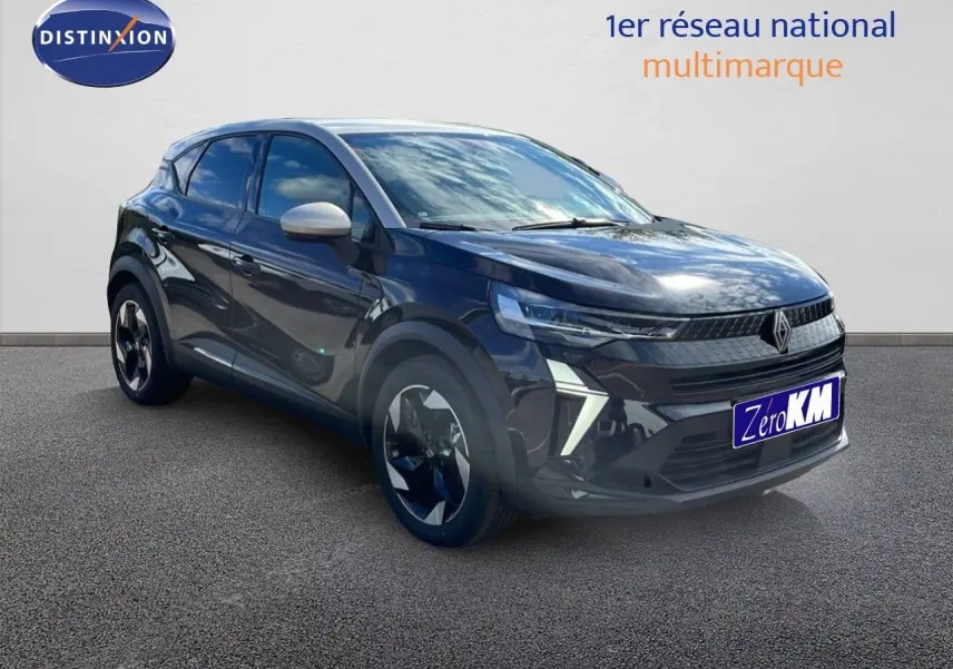Renault Captur 2025 noir étoile métal avec toit gris, vue 3/4 avant mettant en valeur ses phares LED distinctifs.