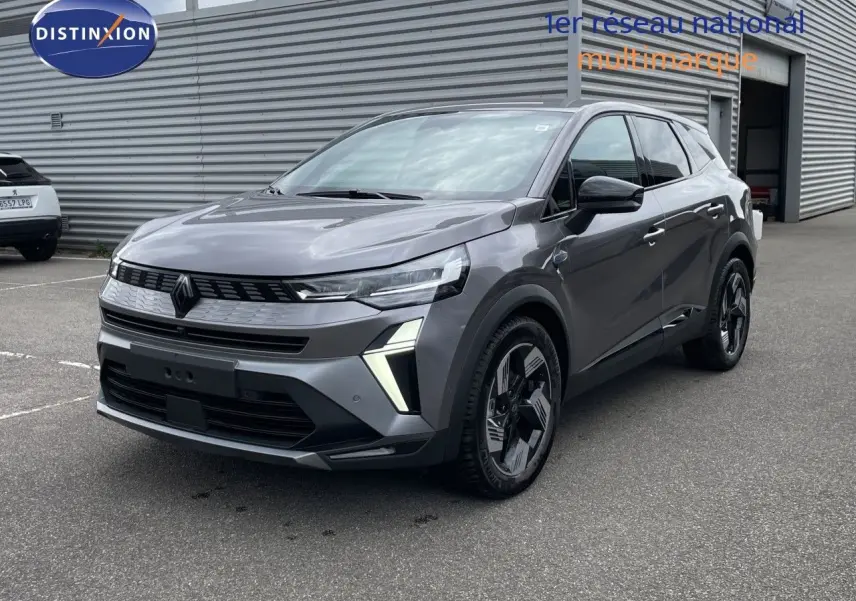 Renault Symbioz gris cassiopée métal en 3/4 avant droit, SUV hybride au design moderne avec feux LED distinctifs.