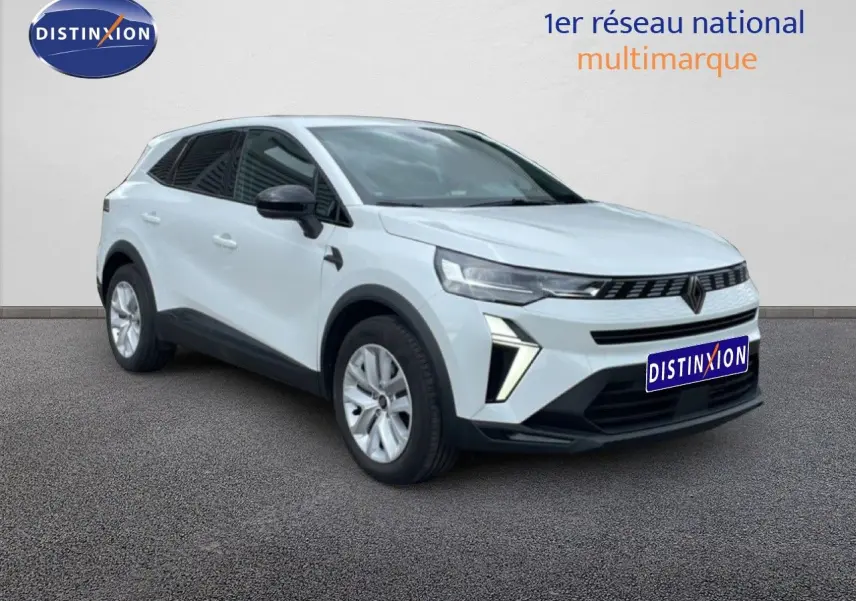 Vue 3/4 avant d'un Renault Symbioz gris rafale métal avec calandre moderne et feux LED distinctifs.