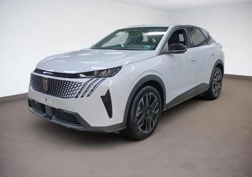 Peugeot 3008 Hybrid blanc Okenite vue 3/4 avant droit avec calandre distinctive et jantes alliage noires.