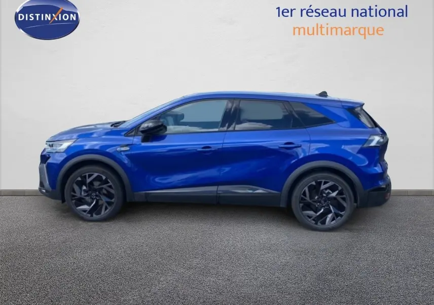 Profil droit du Renault Symbioz E-Tech Full Hybrid 145ch Esprit Alpine en bleu Iron Metal avec jantes noires biton.