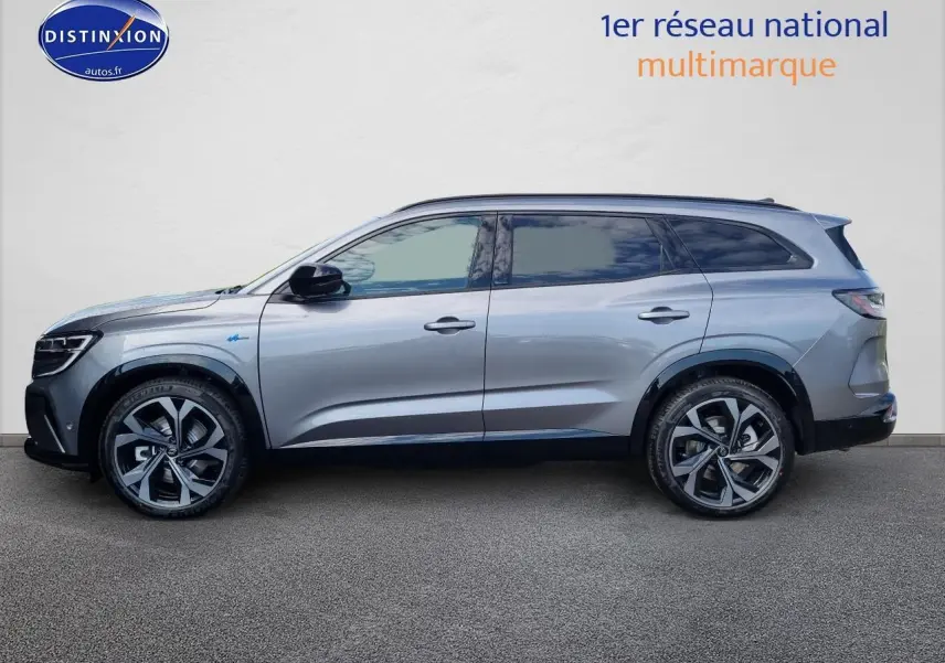 Profil côté gauche du Renault Espace VI gris schiste avec jantes alliage 20 pouces et toit panoramique fixe.