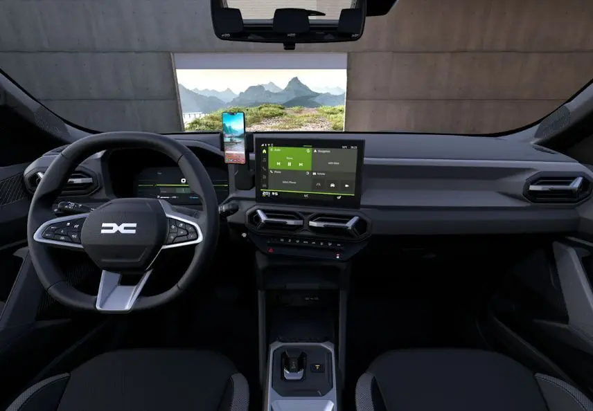 Vue intérieure frontale du tableau de bord du Dacia Duster 2026, avec écran tactile central et volant multifonction.