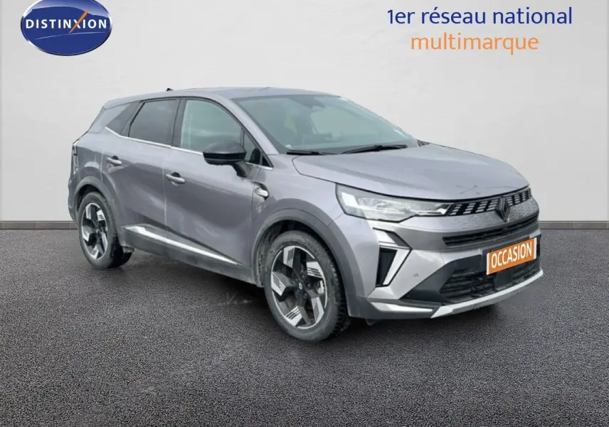 Renault Symbioz gris cassiopée métal en 3/4 avant droit avec jantes originales et calandre moderne.