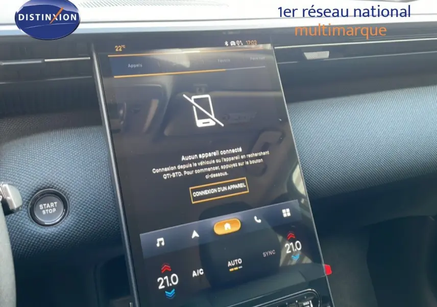 Intérieur du Citroën C5 Aircross Hybrid 2026, vue sur l’écran tactile central et bouton start/stop, ambiance moderne et épurée.