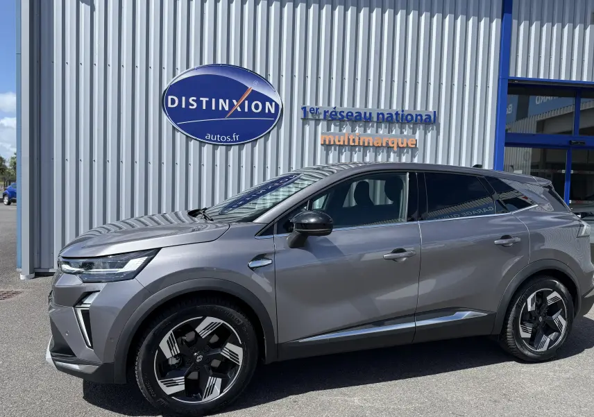 Renault Symbioz gris cassiopée métal vu de profil côté gauche, avec jantes noires et détails modernes.