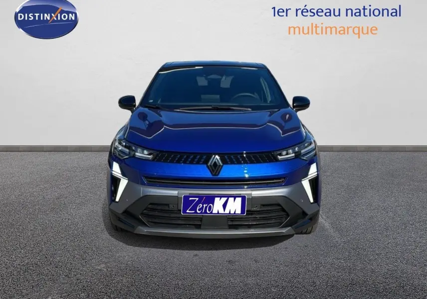 Vue de face du Renault Captur E-Tech hybride 2025 en bleu Iron Metal avec toit noir et éclairage LED distinctif.