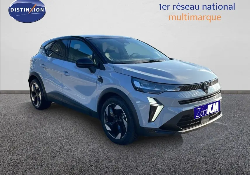 Renault Captur E-Tech gris Rafale métal avec toit noir, vue 3/4 avant mettant en valeur ses feux LED distinctifs.
