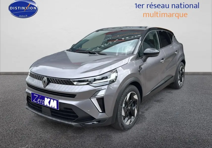 Renault Captur 2025 gris cassiopée en vue 3/4 avant droit avec jantes alu et phares LED allumés.