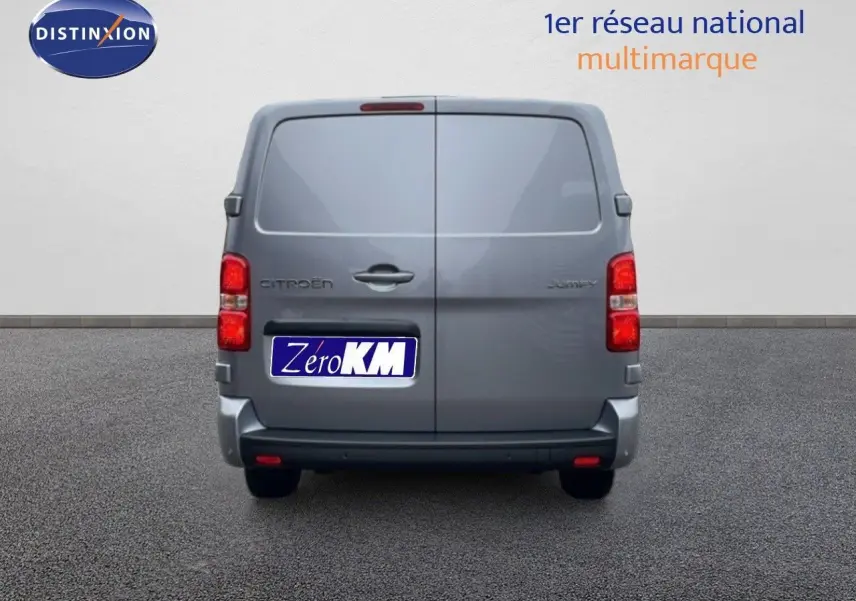 Vue arrière du Citroën Jumpy Van Long L3 gris Artense métallisé avec portes battantes fermées sur fond neutre.