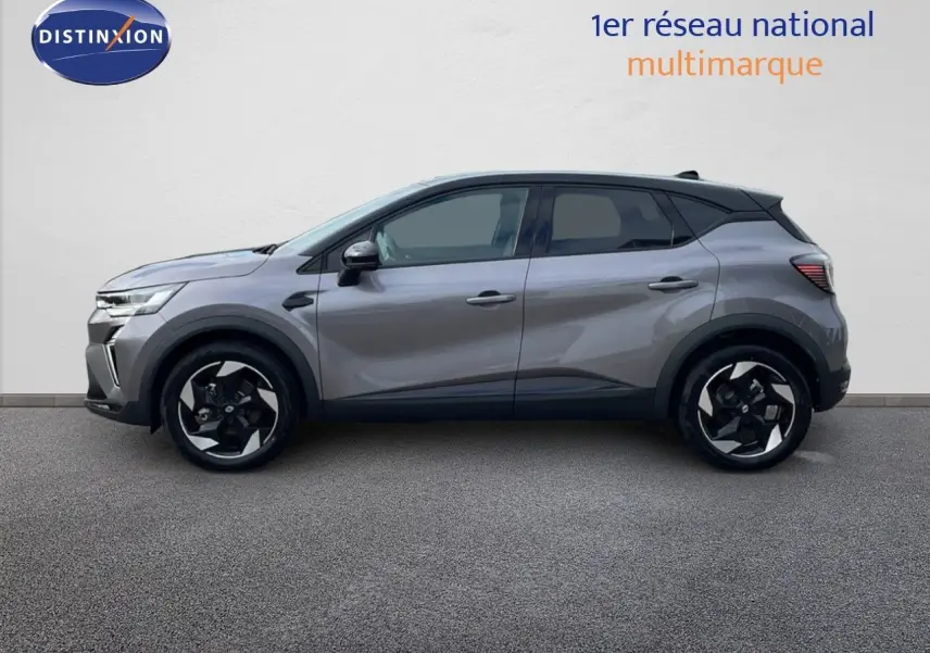 Profil droit d'un Renault Captur E-Tech hybride gris Cassiopée avec toit noir, jantes noires et design moderne.
