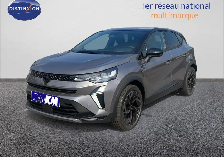 Renault Captur E-Tech hybride gris Cassiopée 3/4 avant droit avec toit noir et jantes noires distinctives.