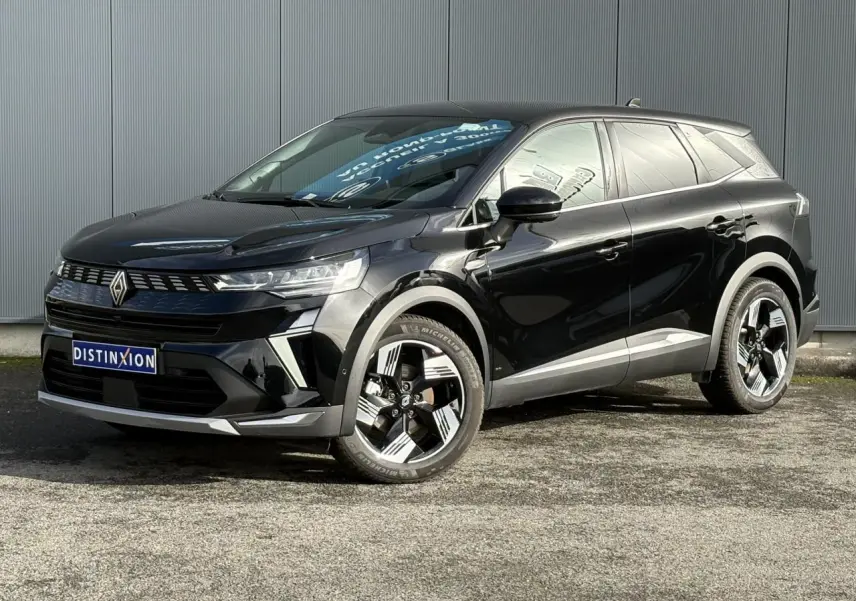 Renault SYMBIOZ E-Tech noir étoilé, vue 3/4 avant droit, avec jantes 18 pouces et détails chromés modernes.