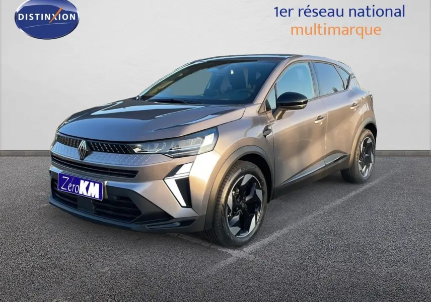 Renault Captur E-Tech hybride gris cassiopée métal en 3/4 avant droit avec jantes noires distinctives.