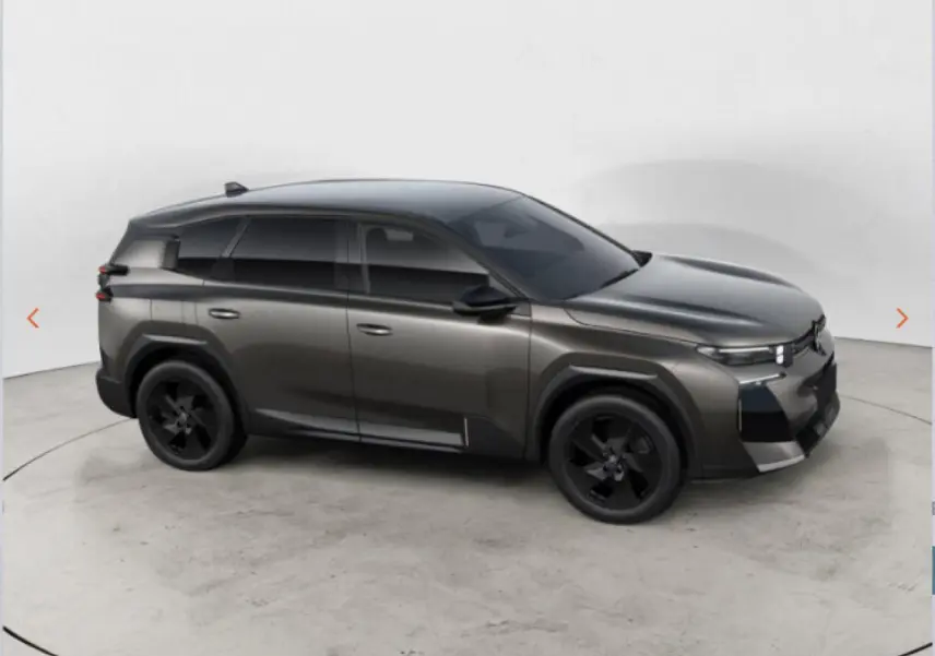 Vue de profil côté droit du Citroën C5 Aircross gris avec jantes noires et vitres teintées.