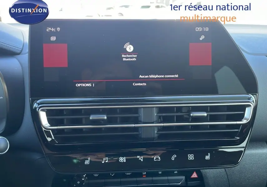 Écran tactile central et aérateurs du tableau de bord du Citroën C5 Aircross 2025, finition gris platinium et toit noir.