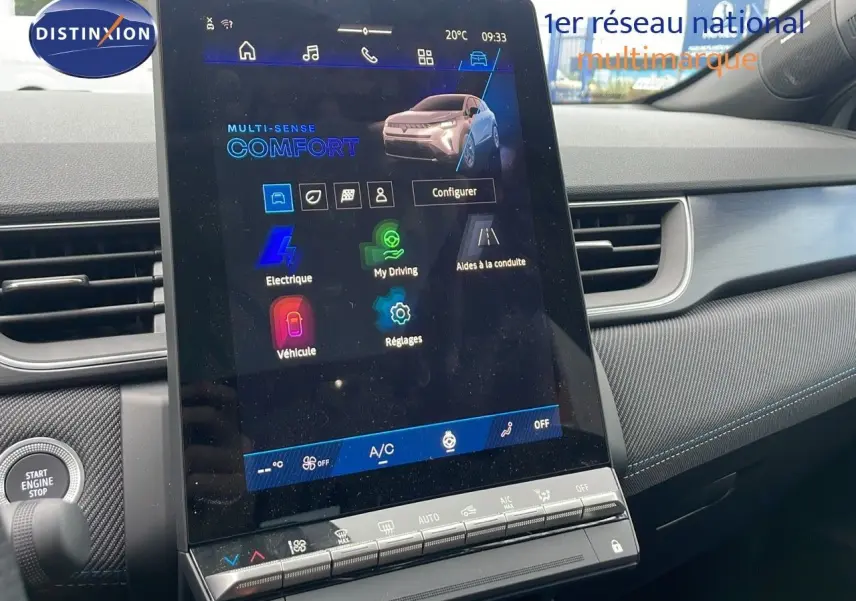 Écran tactile central affichant le menu Multi-Sense Comfort dans l'habitacle gris du Renault Symbioz hybride 2025.