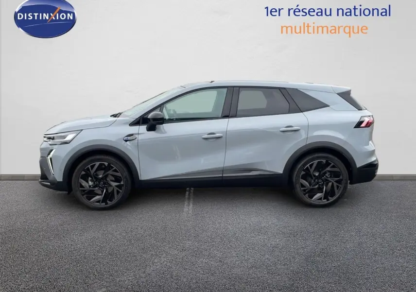 Profil côté gauche du Renault SYMBIOZ gris Rafale métal 2025 avec jantes noires et lignes modernes.