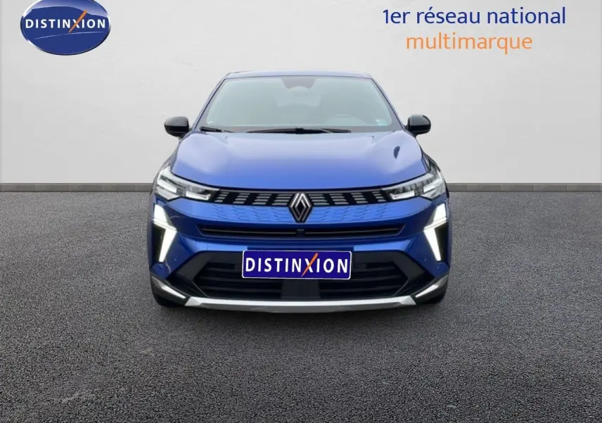 Vue frontale d'une Renault Symbioz 2025 bleu iron metal avec feux LED et calandre moderne.