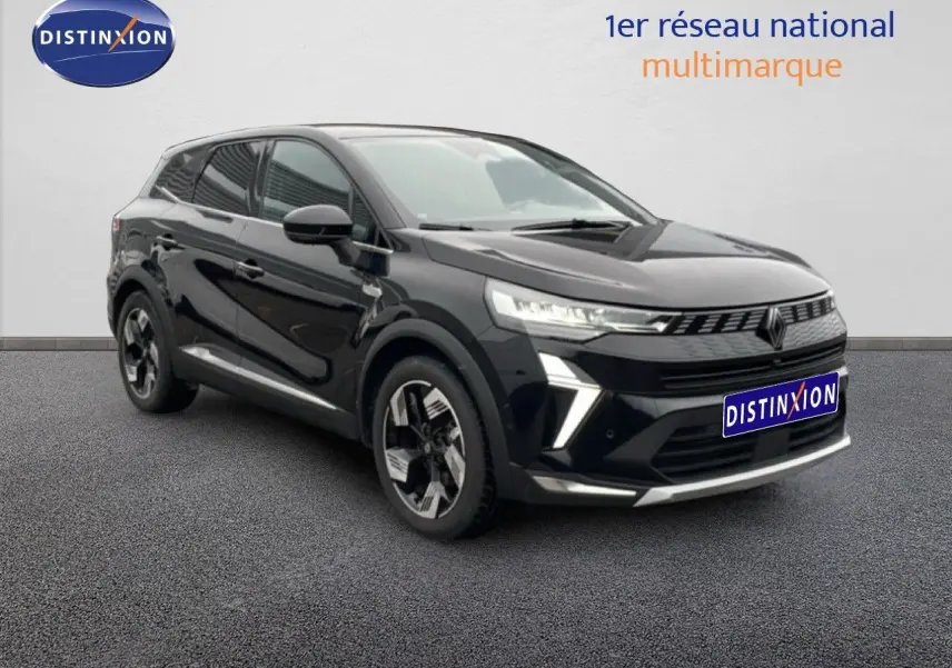 Vue 3/4 avant du Renault Symbioz noir étoile métal, soulignant ses lignes modernes et ses jantes bi-ton distinctives.