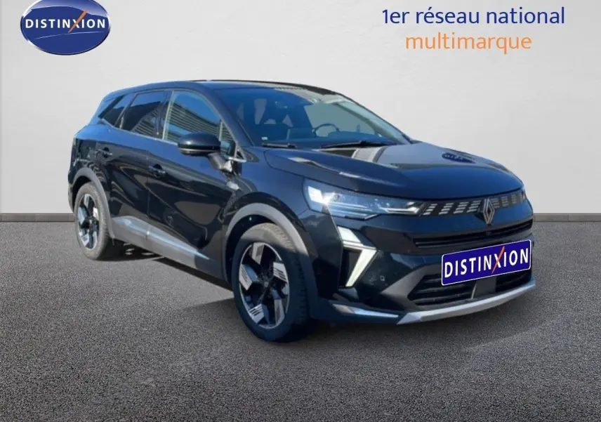 Renault Symbioz noir étoile métal en 3/4 avant droit, SUV hybride avec détails modernes et jantes bicolores.