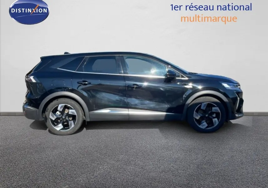 Vue latérale gauche d'un Renault Symbioz 2025 noir étoile métal avec jantes bi-ton et détails chromés sur les bas de caisse.