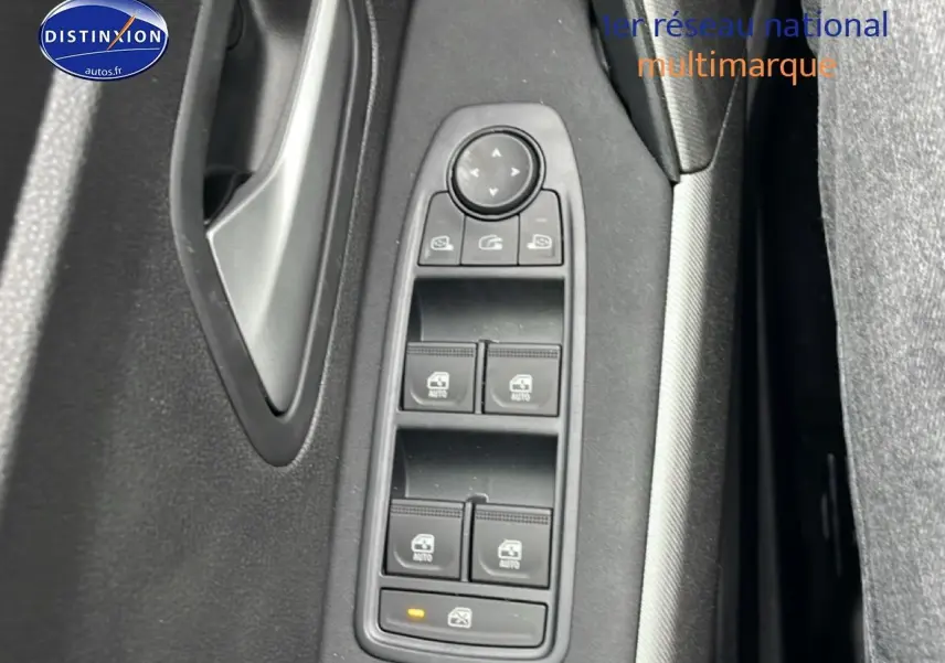 Gros plan sur les commandes des vitres électriques côté conducteur du Dacia Bigster 2025, intérieur noir.