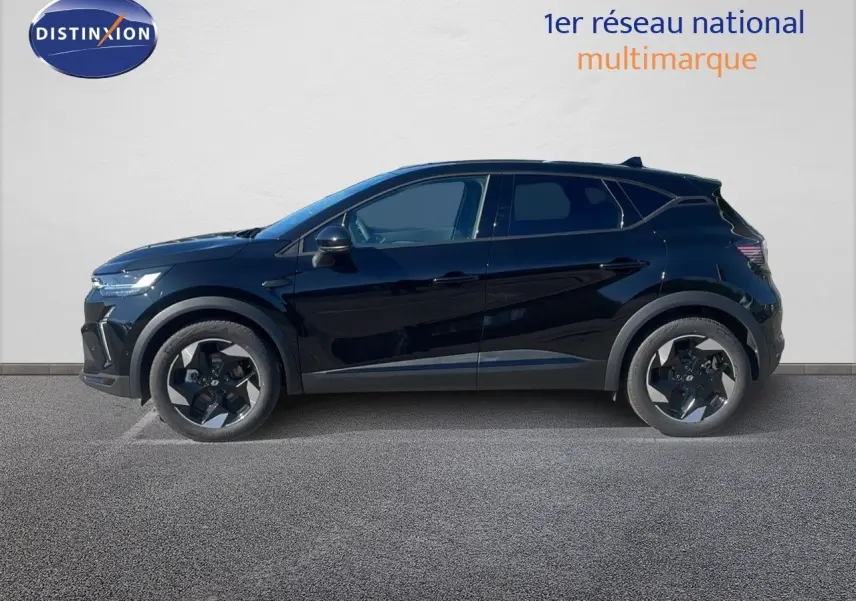 Profil côté gauche du Renault Captur E-Tech hybride 2025 en noir étoile métal avec jantes bi-ton distinctives.
