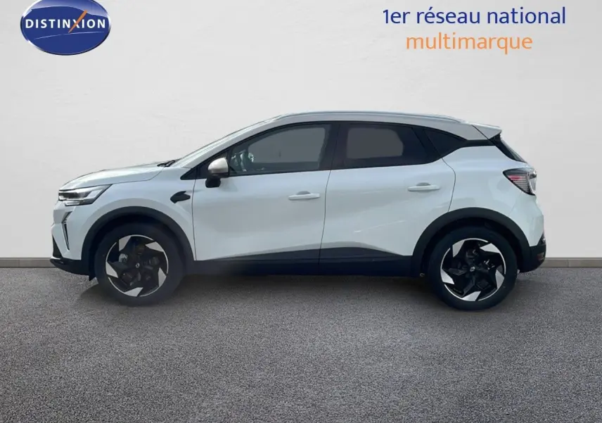 Profil côté gauche du Renault Captur blanc nacré avec toit beige, soulignant ses jantes noires au design moderne.