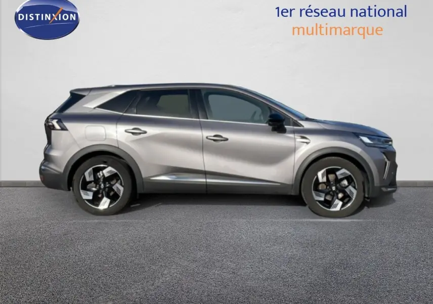 Vue de profil côté gauche d'un Renault Symbioz gris cassiopée métallisé avec jantes noires et détails modernes.