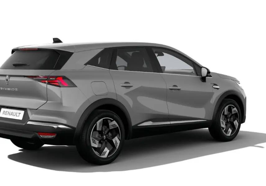 Renault Symbioz gris Rafale vu en 3/4 arrière droit, soulignant ses feux arrière LED et ses jantes bicolores modernes.
