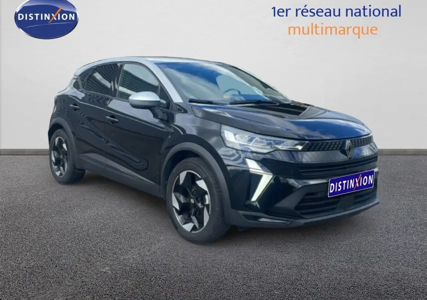 Renault Captur 2025 noir étoile métal avec toit gris, vue 3/4 avant côté gauche, jantes biton et feux LED distinctifs.