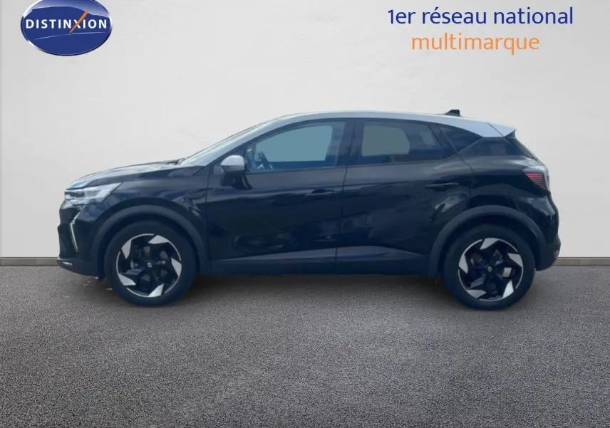 Profil droit d'un Renault Captur 2025 noir étoile métal avec toit gris, jantes bi-ton et lignes modernes.